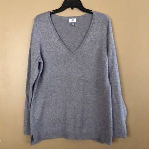 V-neck gray and white sweater